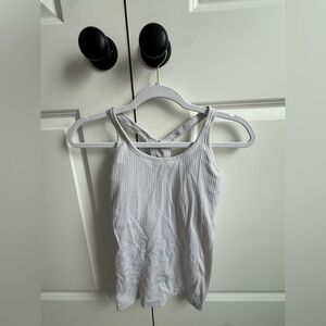 Lululemon Ebb to street white tank top. Size: 4